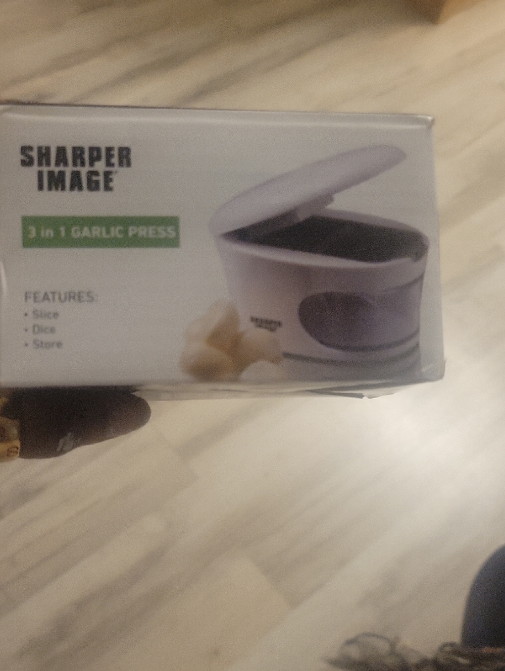 SHARPER IMAGE GARLIC PRESS
